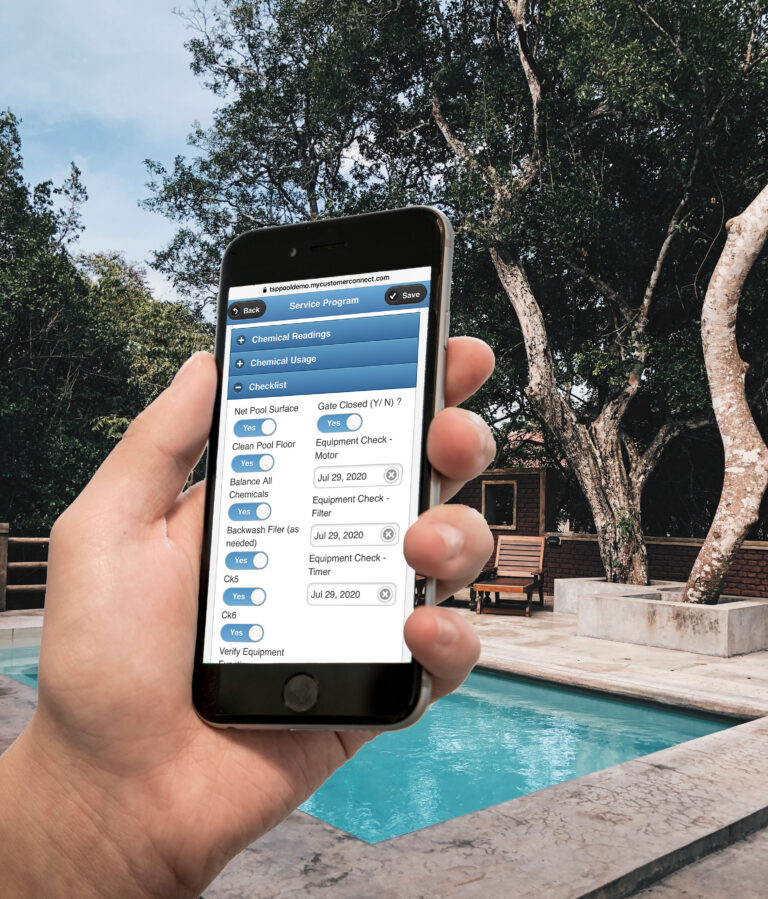 Pool service technician using mobile software in the field
